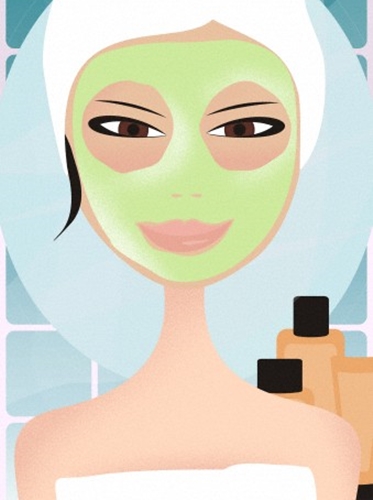 A woman getting a facial at the spa